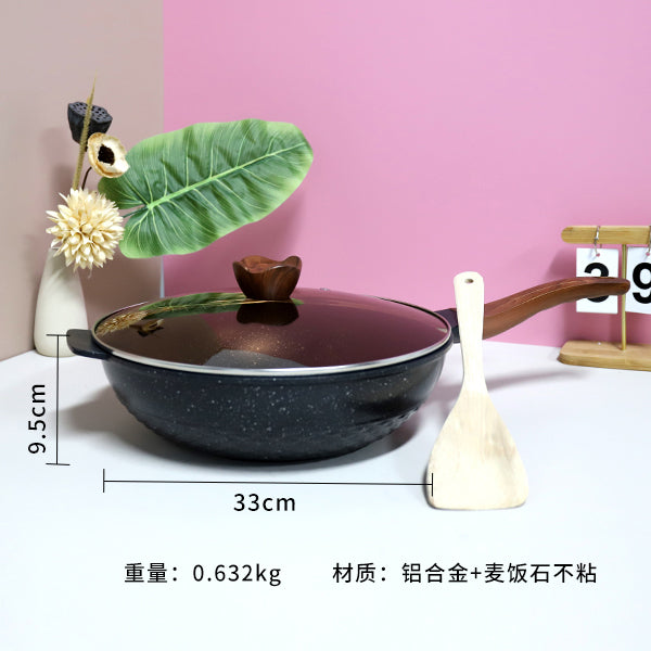 Black ceramic pot with measurements and product details on a white surface with pink background