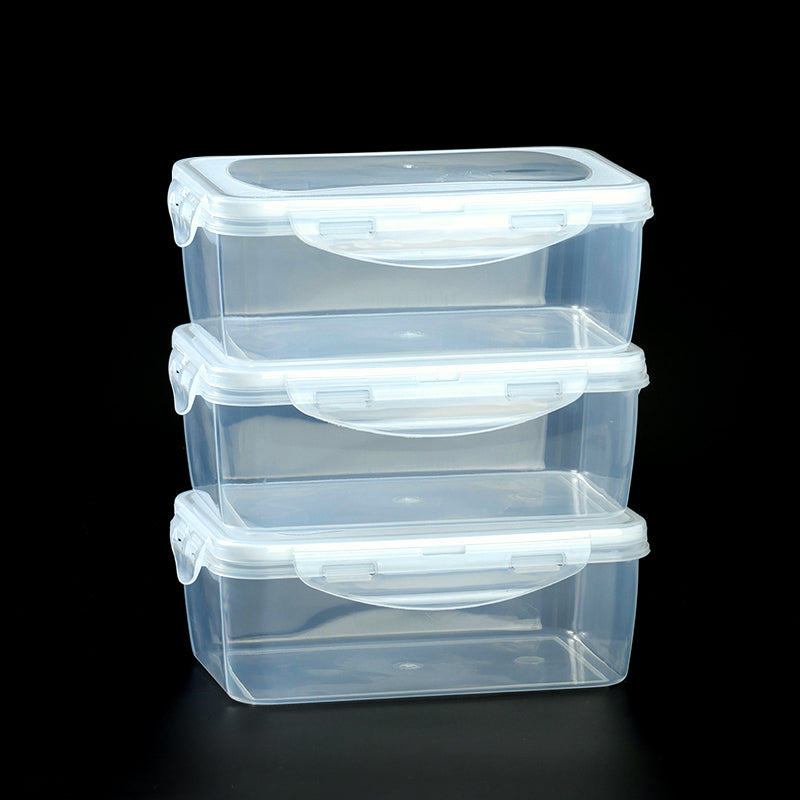 Stack of clear plastic storage containers with lids on a black background